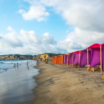 Canoa, Ecuador - February 20, 2015: Activity in the late afternoon on the beach in Canoa, Ecuador on February 20, 2015